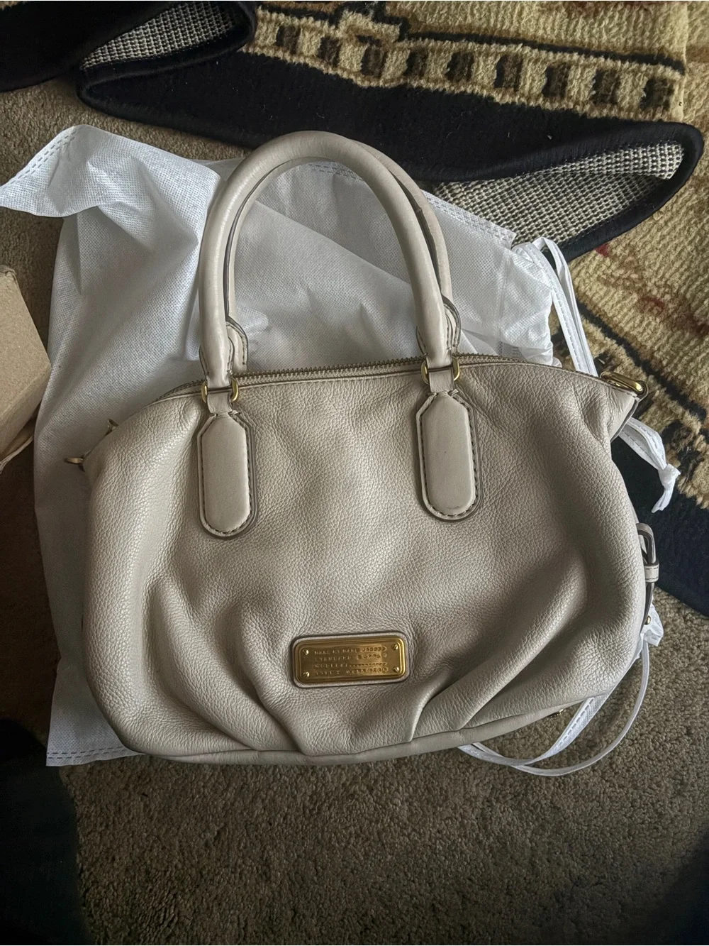 Marc by Marc Jacob’s Cream Leather crossbody  Handbag with Gold Plaque is 12 in